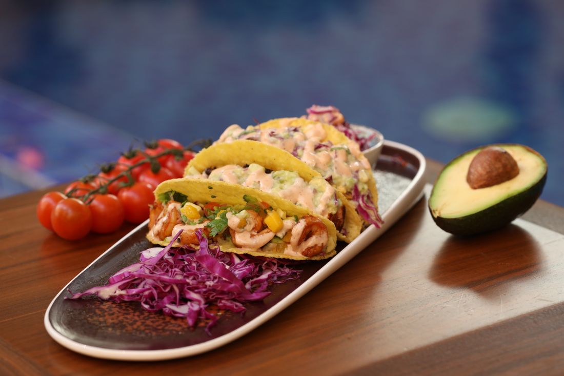 Fish tacos with cabbage and avocado